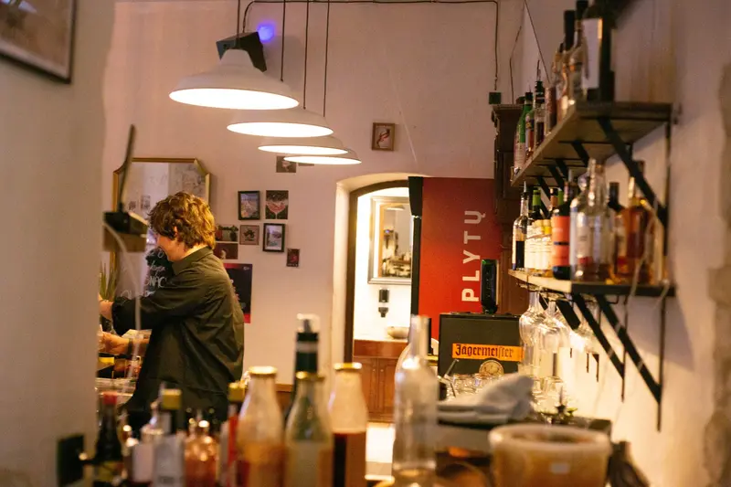 Bartender at work behind the bar