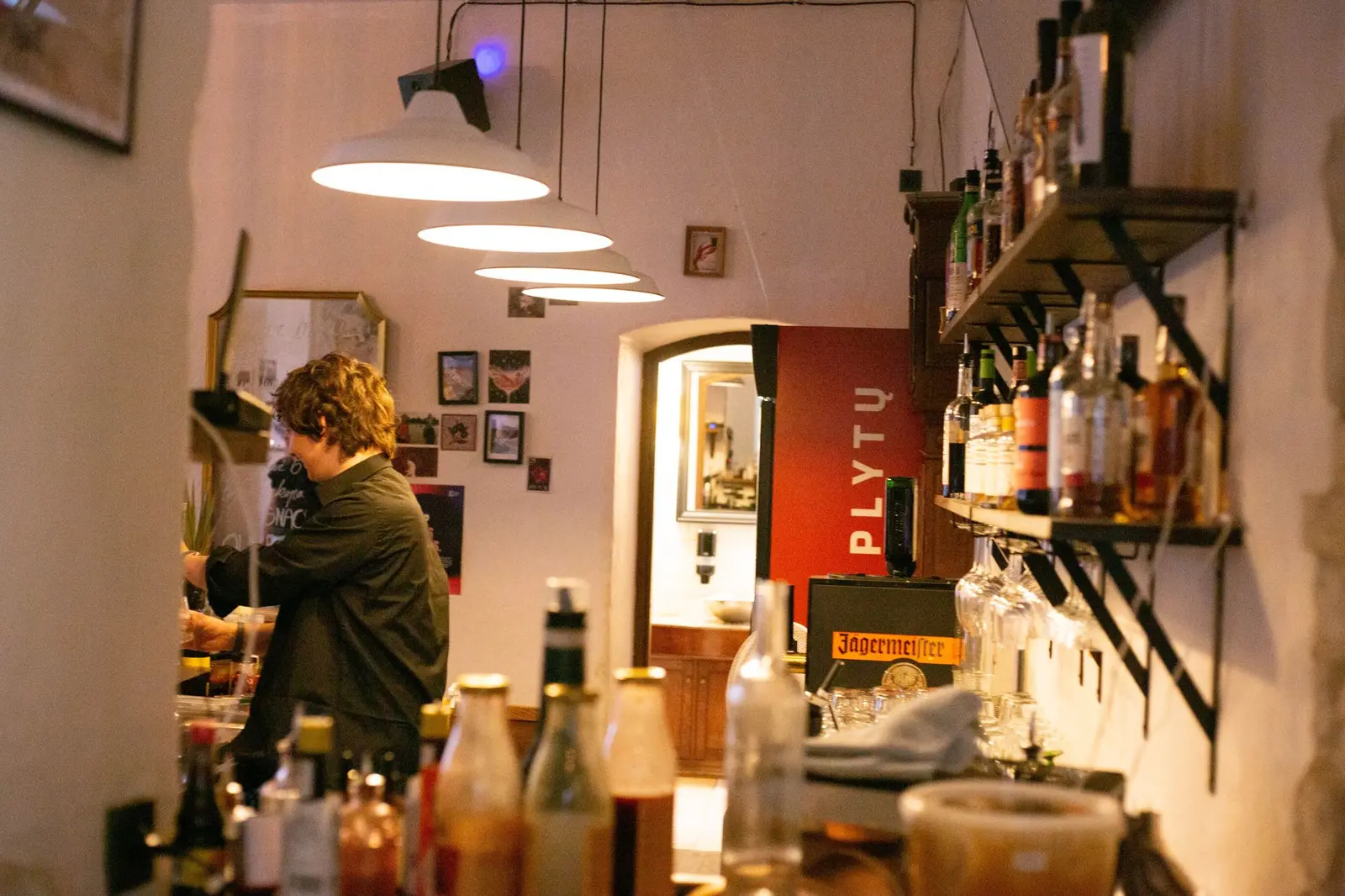 Bartender at work behind the bar